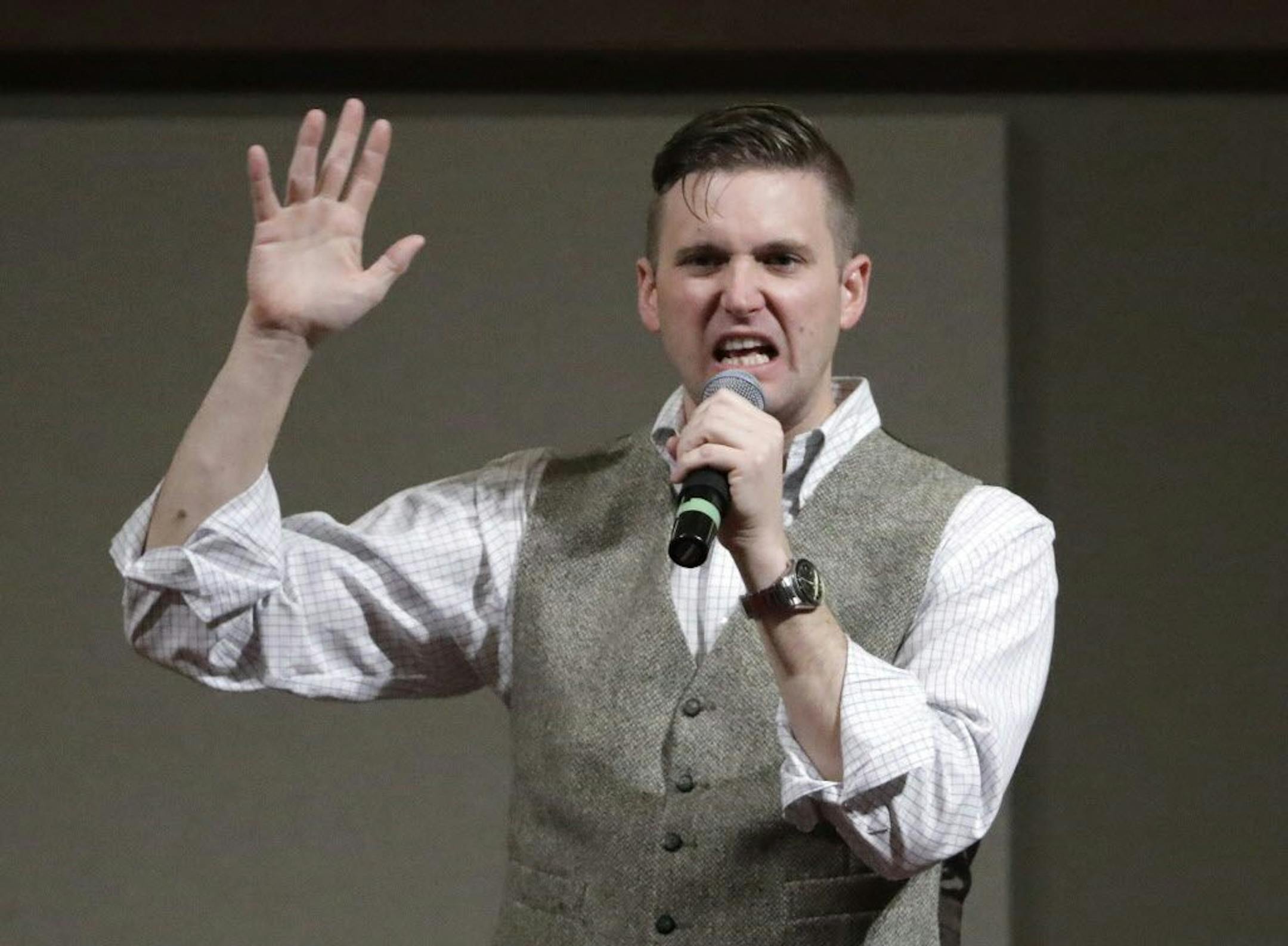 FILE - In this Dec. 6, 2016, file photo, Richard Spencer, who leads a movement that mixes racism, white nationalism and populism, speaks at the Texas A&M University campus in College Station, Texas. Professor C. Christine Fair told The Associated Press on Monday, May 22, 2017, that the Old Town Sport&Health club in Alexandria, Va., informed her that it terminated the membership of Spencer following last Wednesday's confrontation in the gym where she called him a neo-Nazi.