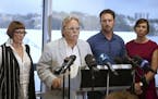 Along with his family, John Ruszcyk, second left, demanded Thursday in Sydney, Australia, a more rigorous probe into the fatal shooting of his daughte