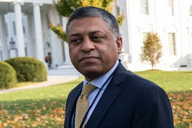 FILE - Dr. Rahul Gupta, the director of the White House Office of National Drug Control Policy, walks outside of the White House, Nov. 18, 2021, in Wa