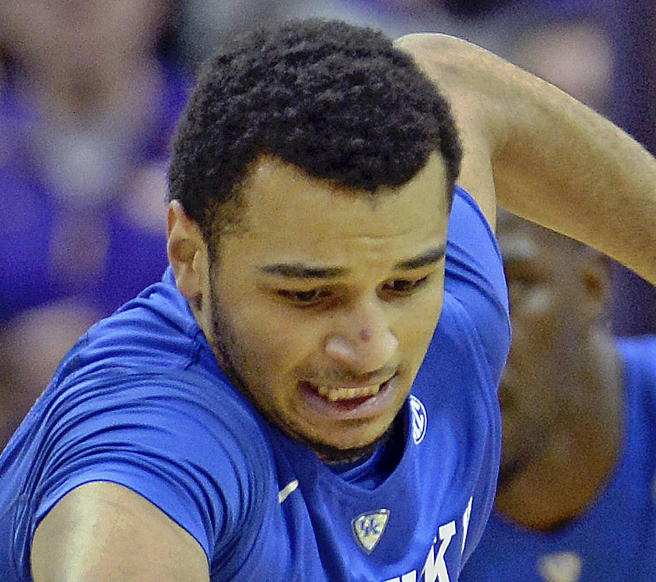 Kentucky guard Jamal Murray (23) works to maintain control of the ball he just stole from LSU guard Josh Gray (5) in the first half of an NCAA college basketball game in Baton Rouge, La., Tuesday, Jan. 5, 2016. (AP Photo/Bill Feig) ORG XMIT: LABF104 ORG XMIT: MIN1605132340200599