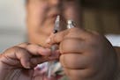 FILE - In this April 18, 2017 file photo, a woman with Type 2 diabetes prepares to inject herself with insulin at her home in Las Vegas. The skyrocket