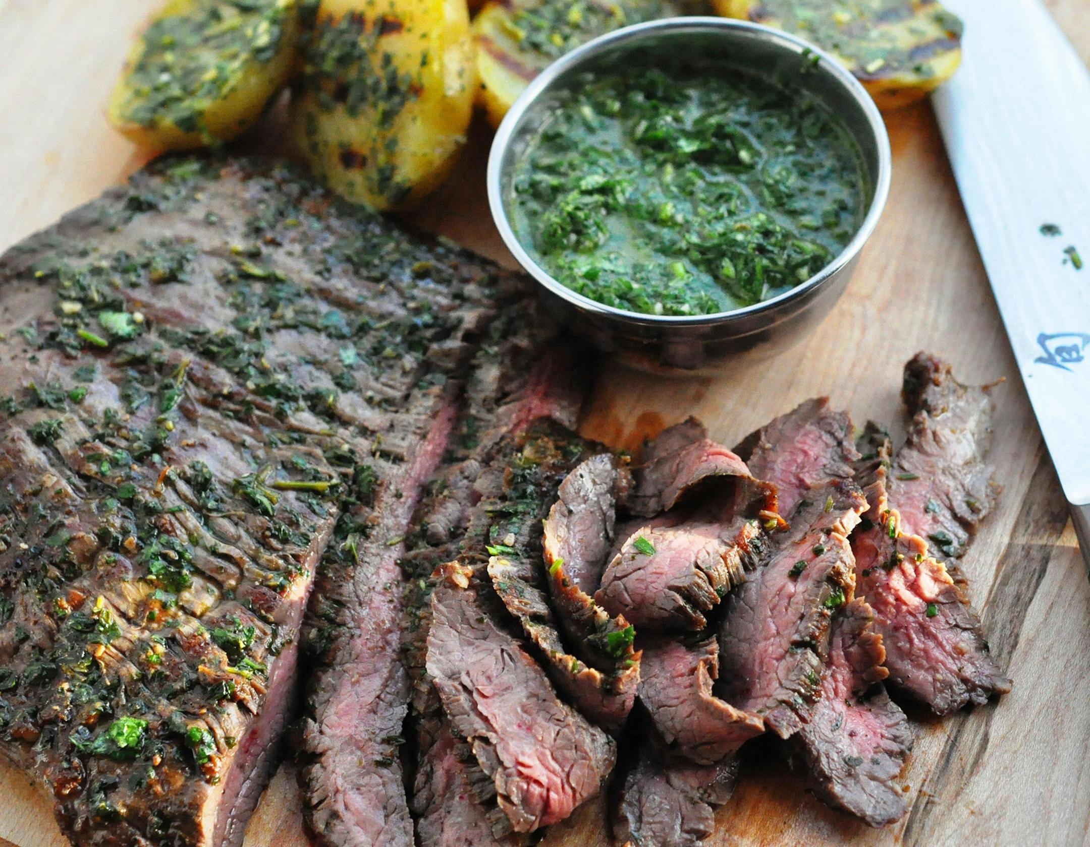 Credit: Meredith Deeds, Special to the Star Tribune Grilled Herbed-Basted Steak and Potatoes for healthy family.