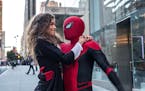 M.J. (Zendaya) catches a ride from Spider-Man (Tom Holland) in "Spider-Man: Far From Home."