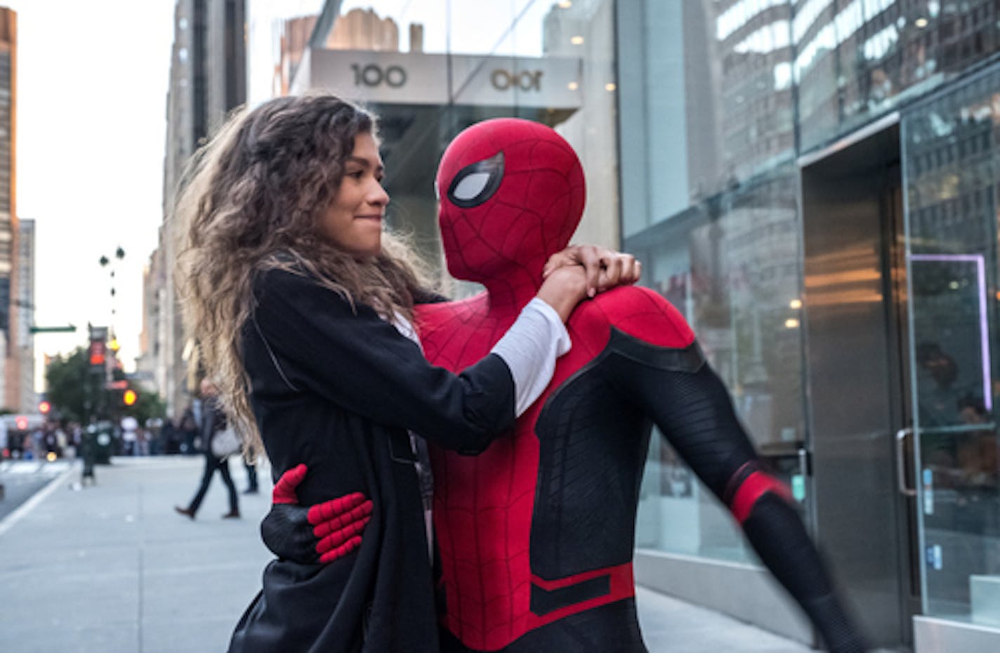 M.J. (Zendaya) catches a ride from Spider-Man (Tom Holland) in "Spider-Man: Far From Home."