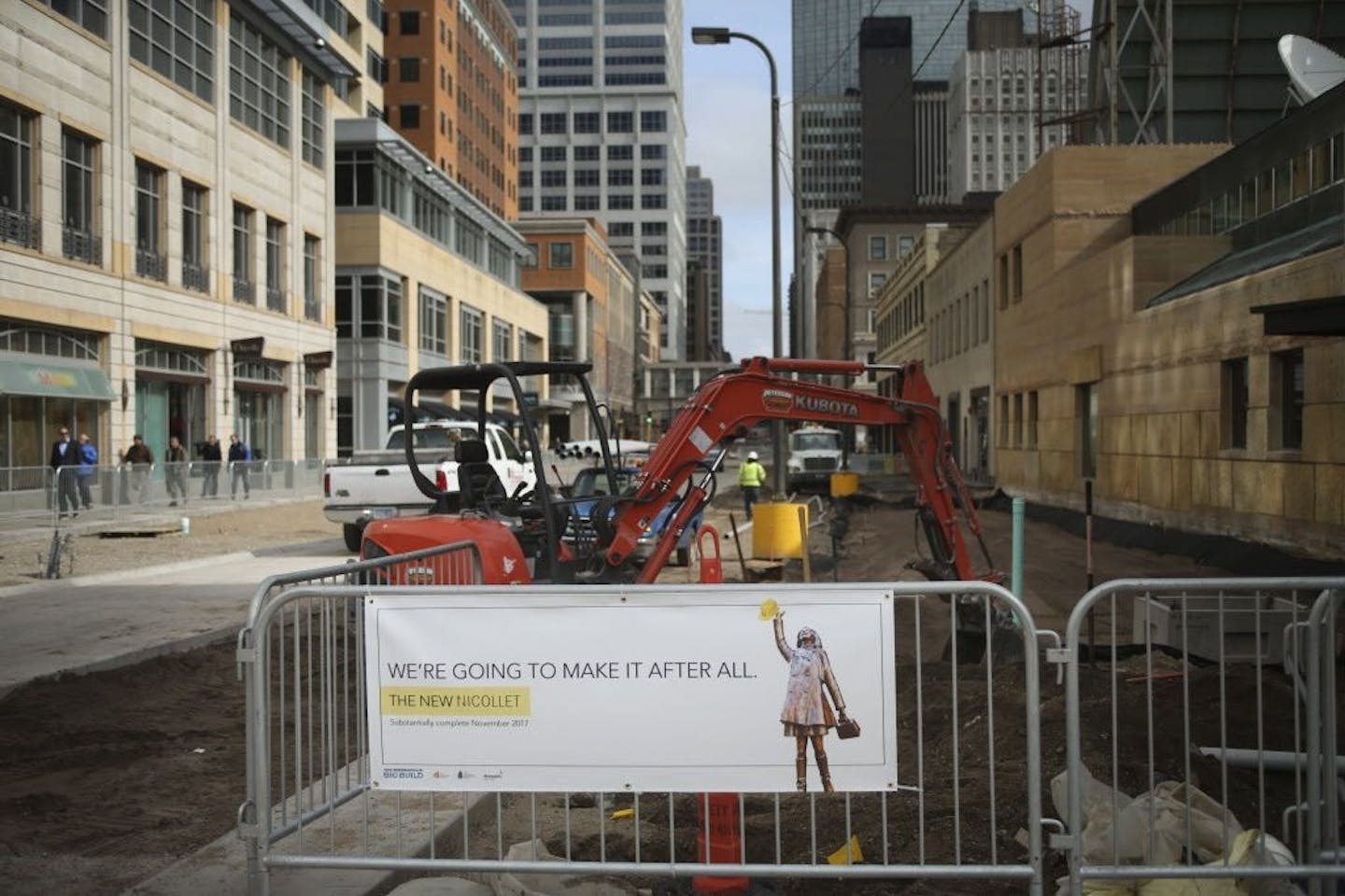 Barricades lined sidewalks and blocked streets along Nicollet Mall in downtown Minneapolis during its reconstruction.