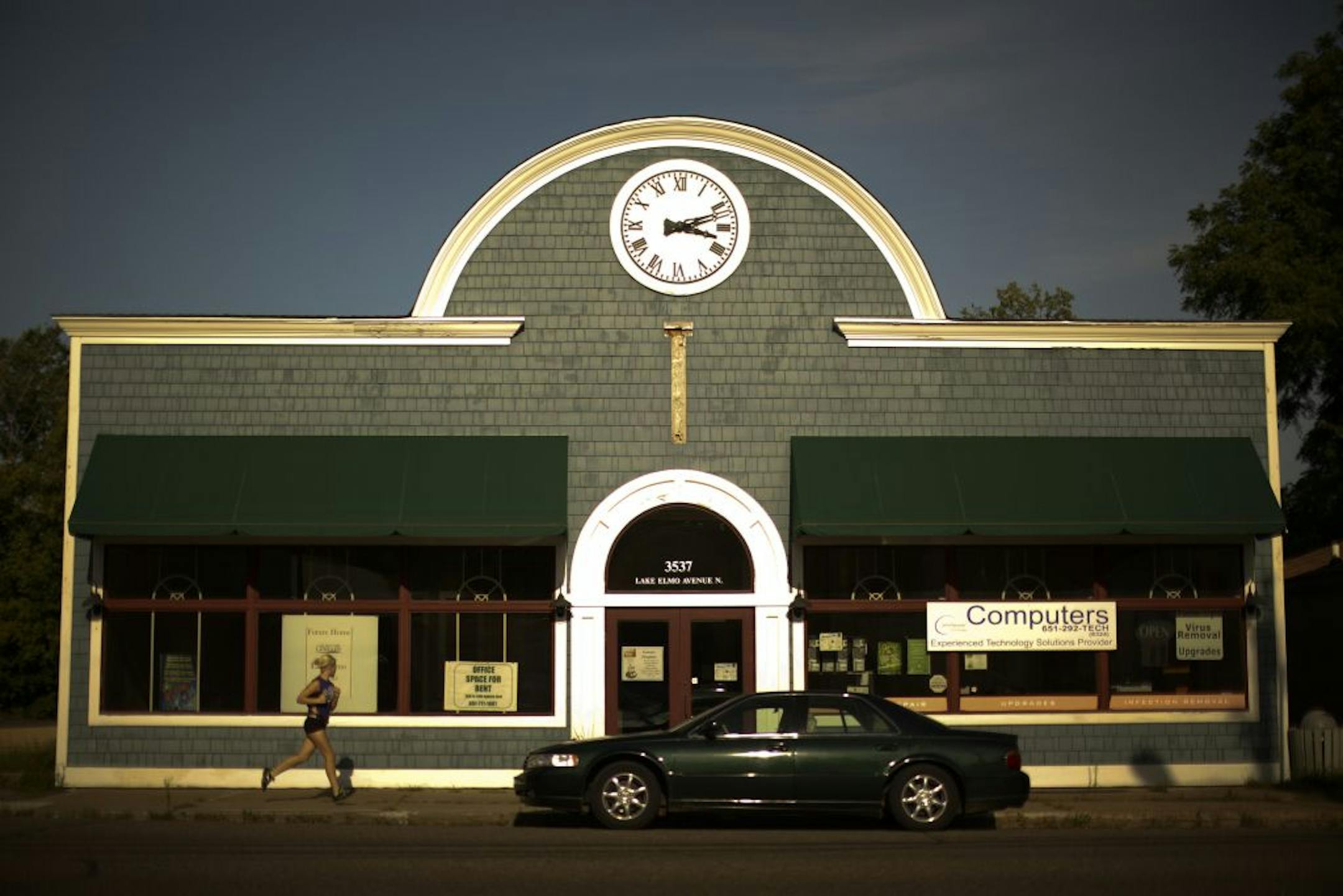 Lake Elmo withdrew from the Washington County system on Jan. 1 to start its own library. The city used the money it would have paid to the county system to buy a former car dealership and transform it into its new home. It's about ready to open, thanks to volunteers who have spent time painting walls and stocking shelves. Exterior of the former car dealership on Lake Elmo Ave. that will house the soon-to-open Lake Elmo Public Library Monday evening, August 6, 2012. JEFF WHEELER � jeff.wheeler@st