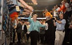 Tennessee coach Pat Summitt celebrates with Volunteer fans following a 64-48 victory over Stanford in the NCAA Women's Basketball Championship game at