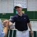 Winner Jesse Bull got congratulated by fellow golfers after the trophy ceremony. ] (KYNDELL HARKNESS/STAR TRIBUNE) kyndell.harkness@startribune.com Th