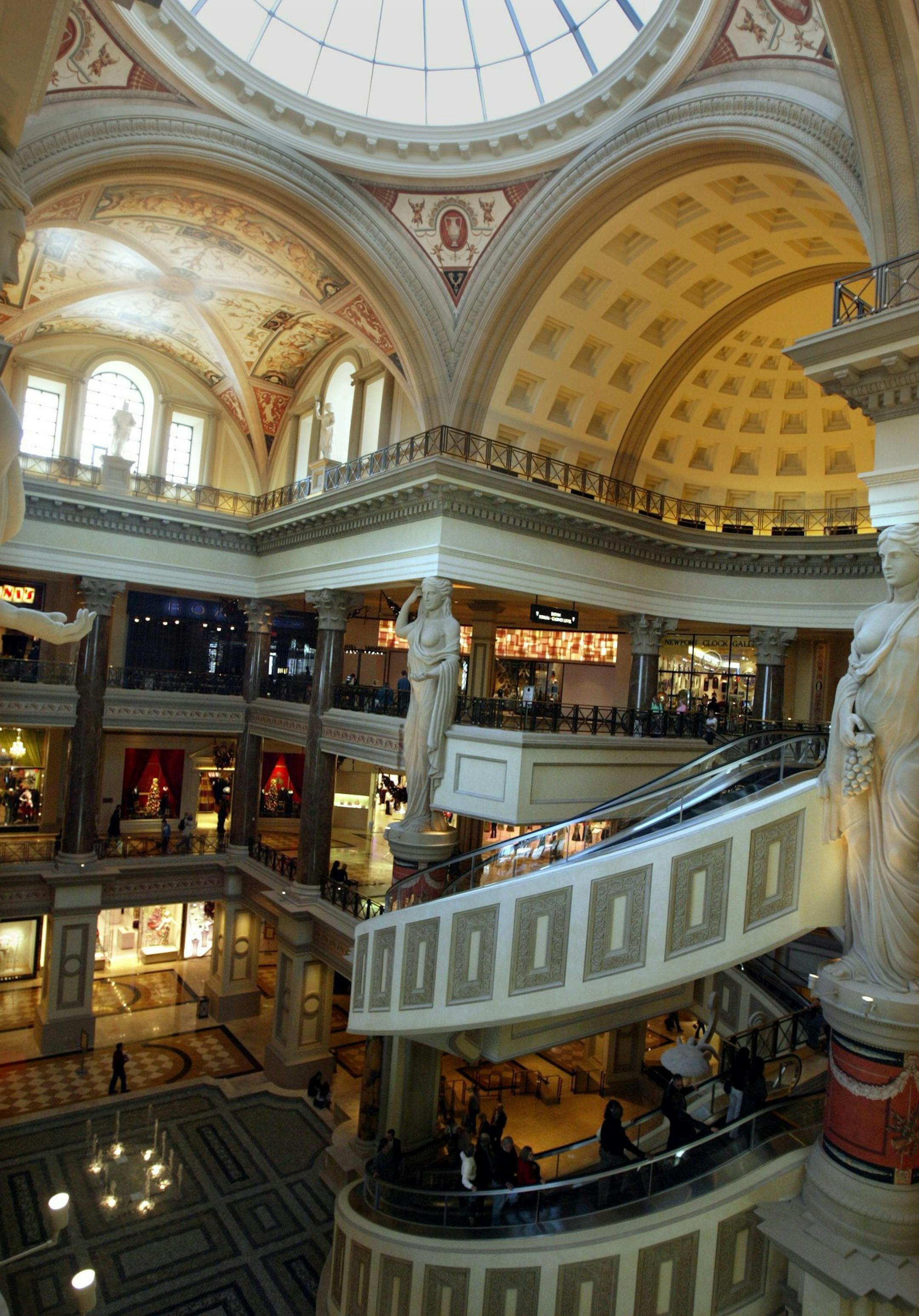 ** FILE** The addition to the Forum Shops at Caesars Palace in Las Vegas, is crowded with Christmas shoppers, Friday, Dec. 17, 2004. High-end luxury shopping has become a tourist attraction for visits to Las Vegas, especially during the holidays. (AP Photo/Joe Cavaretta) ORG XMIT: NVJC801