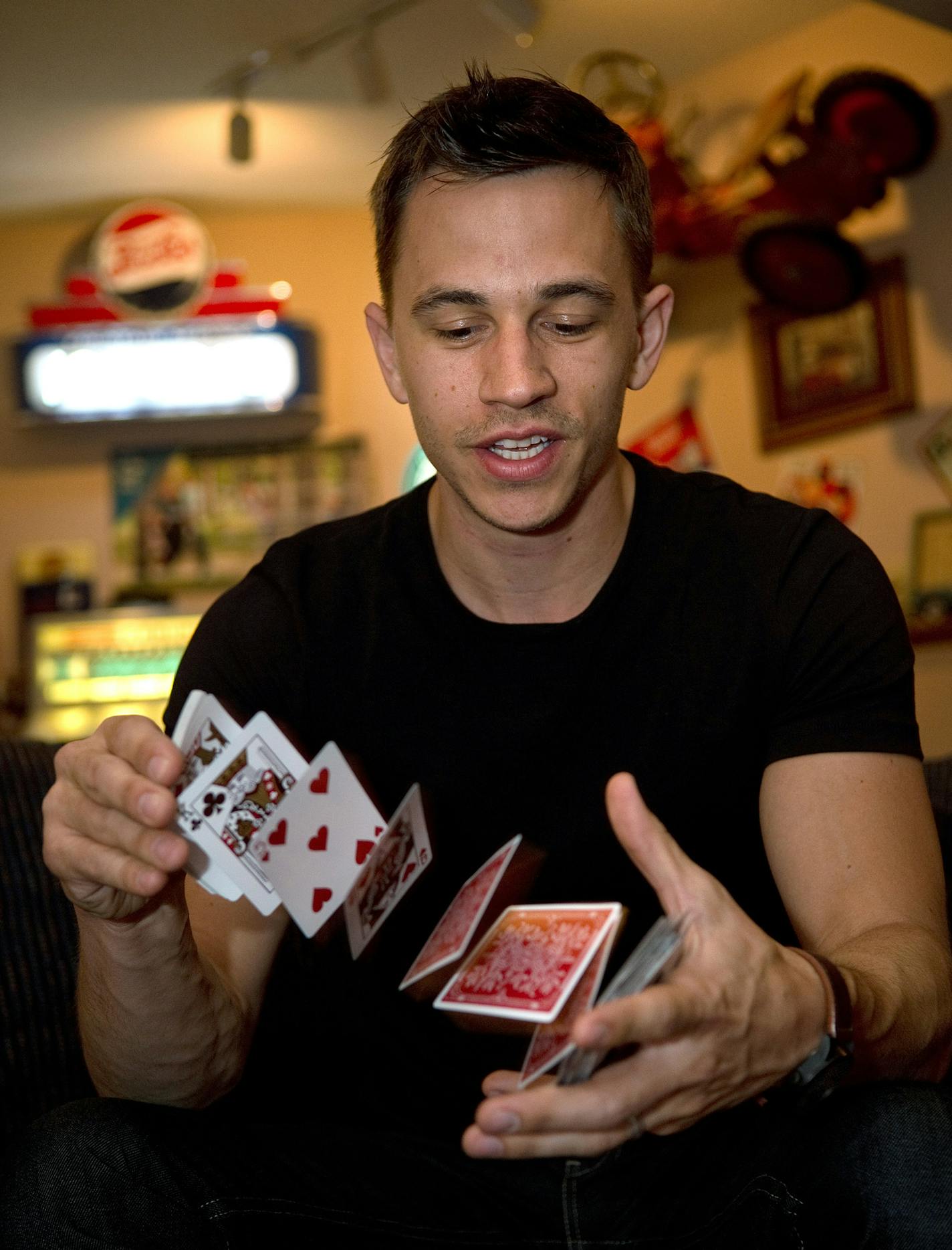 Magician and Minnesota-native, Justin Flum says he constantly shuffles a deck of cards each day. ] (SPECIAL TO THE STAR TRIBUNE/BRE McGEE) **Justin Flum (magician)