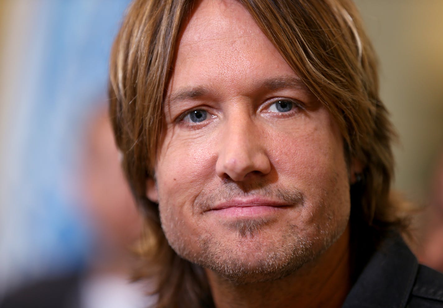 American Idol judge Keith Urban talks to local media at the Minneapolis Convention Center to judge the local American Idol XIV auditions on Wednesday, September 24, 2014.