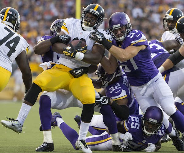 Pittsburgh Steelers' Kevin Fogg is stopped by the Minnesota Vikings defense during the first quarter of the 2015 NFL Hall of Fame Game on Sunday, Aug.