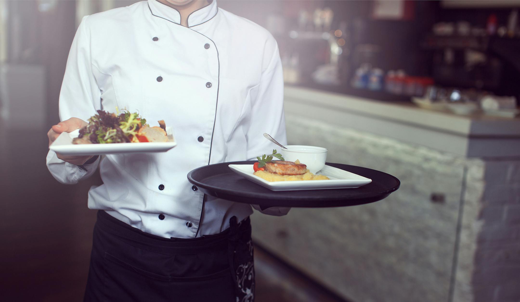 iStockphoto.com
Waiters carrying plates.