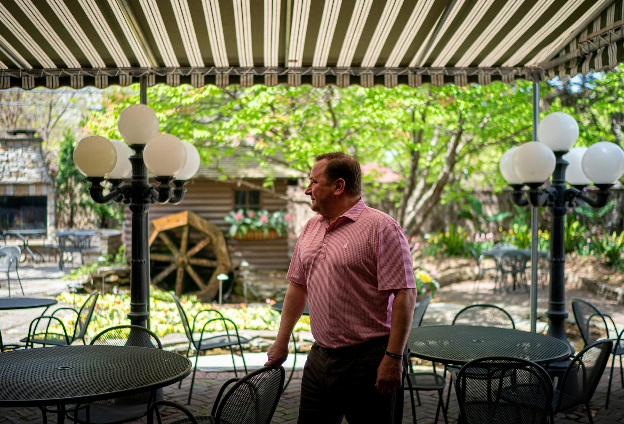 Bill Kozlak, owner of Jax Cafe. This outdoor patio is usually filled with diners. In the early 1950's Jax became the first restaurant to offer outdoor dining. The stream in the outdoor patio is stocked with trout where diners can pick the trout of their choice for dinner.
