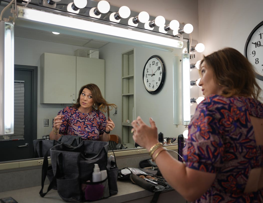 Ries does her own hair before going on-air for “TCL” at KSTP's studio. Her response to criticism about her appearance has evolved over time.