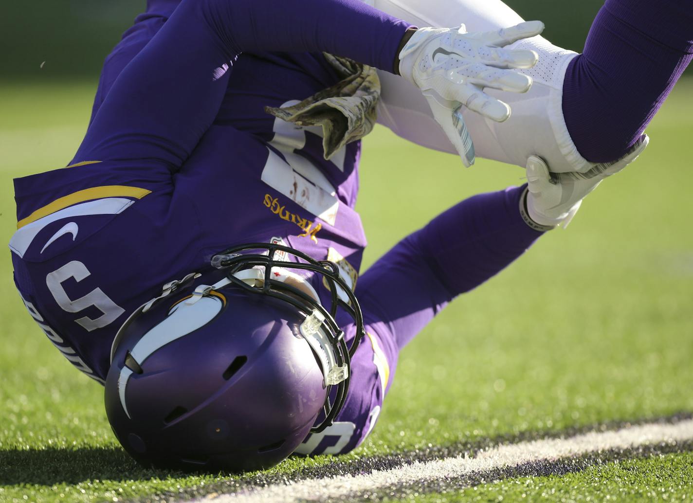 Vikings quarterback Teddy Bridgewater clutched his knee after getting hit low and late by Rams defensive end William Hayes during the third quarter Sunday. No flag was thrown. Bridgewater later suffered a concussion after getting hit by Rams cornerback Lamarcus Joyner.