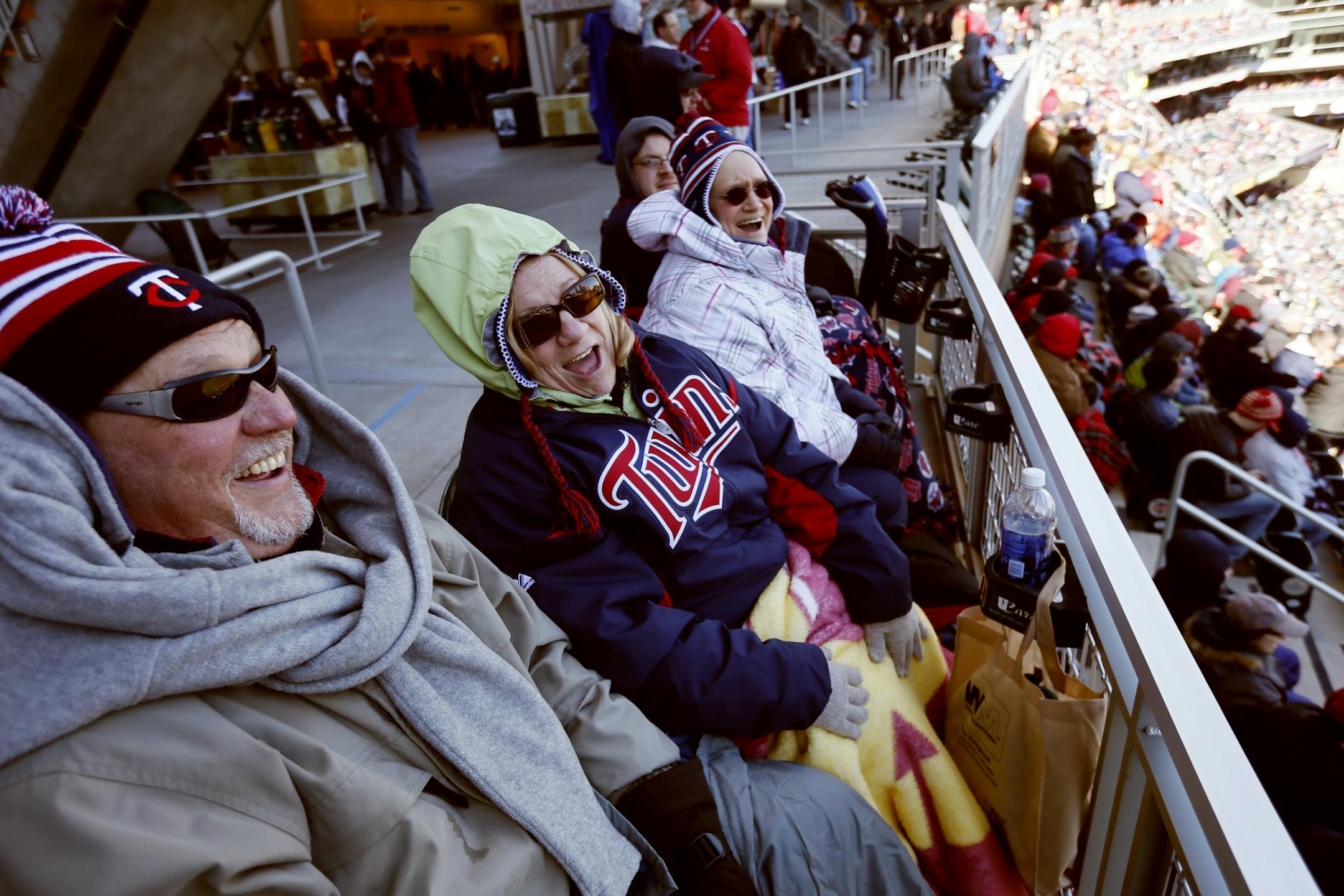 Twins fans (left to right) Denny Friederichs, Helene Dale and Cindy Mines were bundled up for the cold as the Twins took on the Detroit Tigers on opening day at Target Field on April 1, 2013.