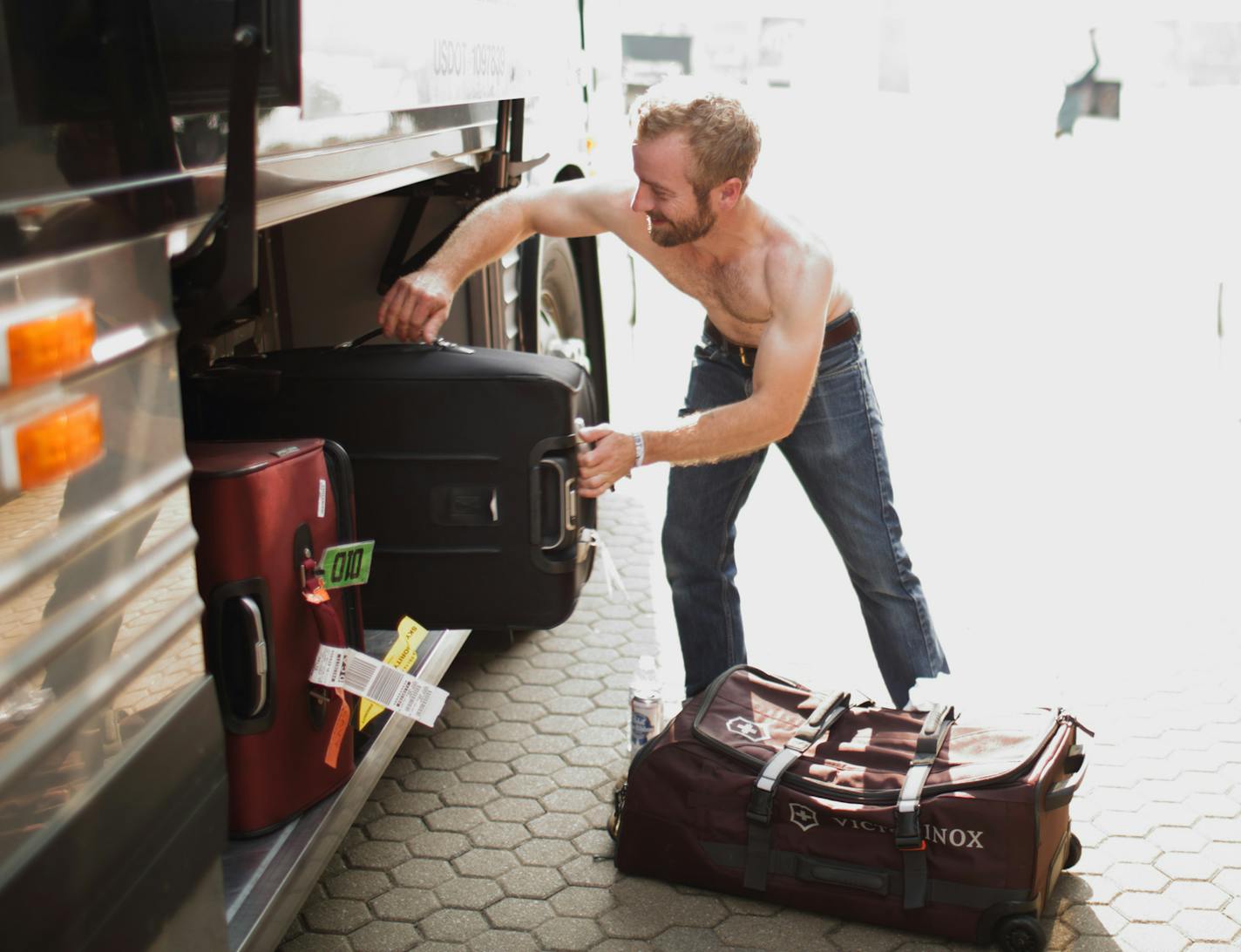 Dave Simonett went into his luggage to find a fresh t-shirt to change into after the band's show at the Forecastle Festival in Louisville, KY. ] JEFF WHEELER &#x201a;&#xc4;&#xa2; jeff.wheeler@startribune.com Trampled By Turtles performed at the Forecastle Festival in Louisville, Kentucky on Sunday, July 20, 2014.