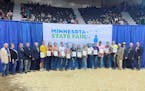 Some of the 2022 Minnesota State Fair scholarship recipients, and State Fair Board members.