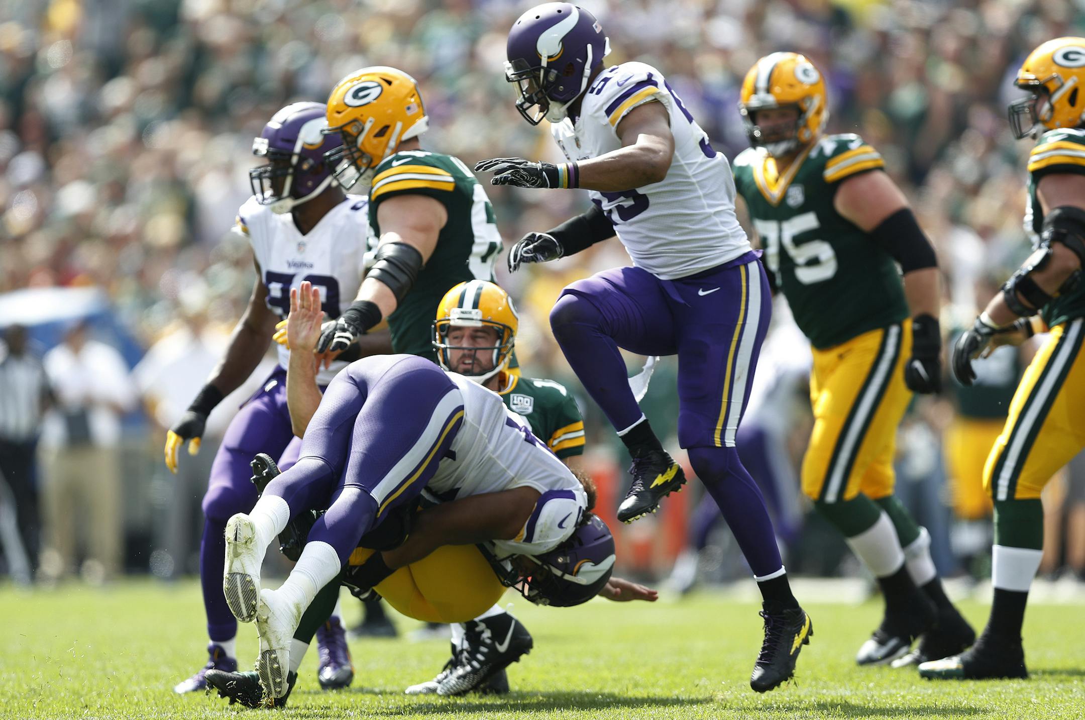 Minnesota Vikings linebacker Eric Kendricks (54) was called for roughing as he tackled Green Bay Packers quarterback Aaron Rodgers (12) in the first half Sunday September 16, 2018 in Green Bay, WI. ] JERRY HOLT ï jerry.holt@startribune.com.