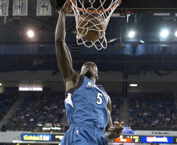 Timberwolves center Gorgui Dieng jammed the ball home early in Minnesota's win in Sacramento, Calif.