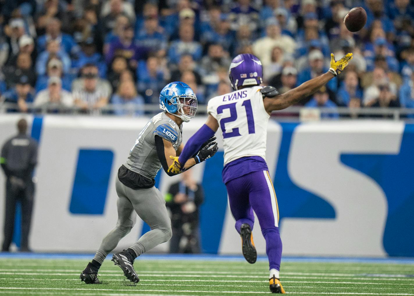 Detroit Lions wide receiver Amon-Ra St. Brown (14) beat Minnesota Vikings cornerback Akayleb Evans (21) for a 70 yard fourth quarter touchdown catch Sunday January ,7 2024 in, Detroit, Mich. ] JERRY HOLT • jerry.holt@startribune.com