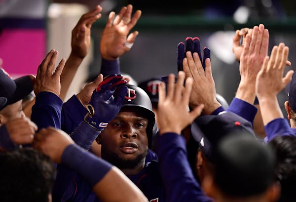 The Twins' Miguel Sano was congratulated by teammates after hitting a two-run home run in the eighth inning against the Los Angeles Angels on Monday.