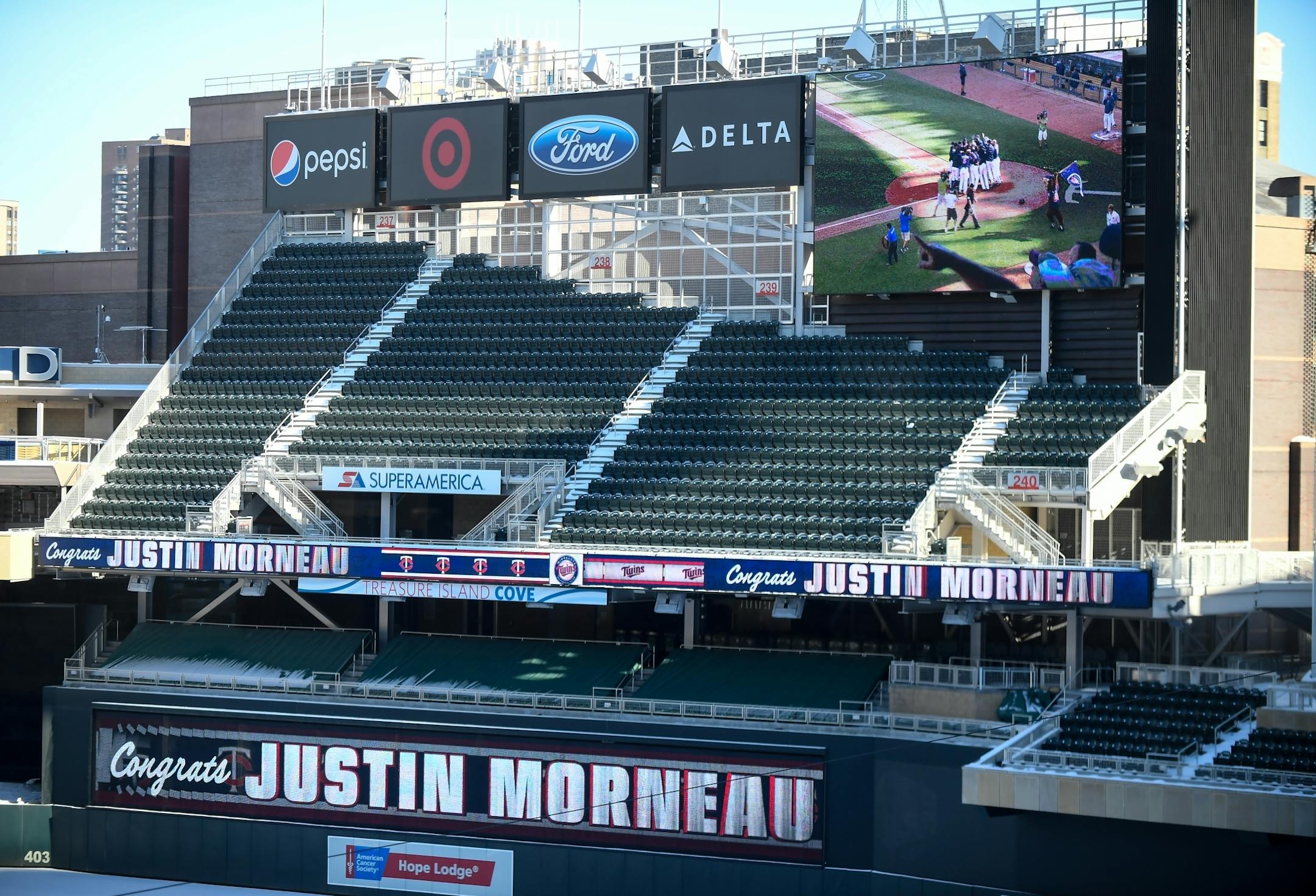 Target Field's video boards displayed congratulatory messages for former first baseman Justin Morneau during his retirement press conference Wednesday afternoon.