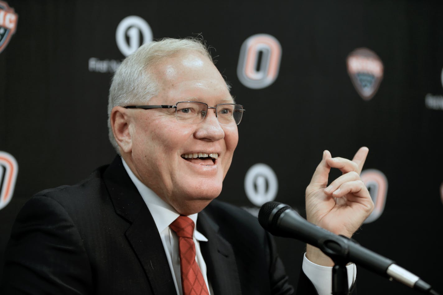 FILE- In this Oct. 6, 2015, file photo, Omaha coach Dean Blais smiles during the school's annual NCAA college hockey media day in Omaha, Neb. Coach Blais announced Tuesday, March 14, 2017, he will step down after eight seasons. (AP Photo/Nati Harnik, File)