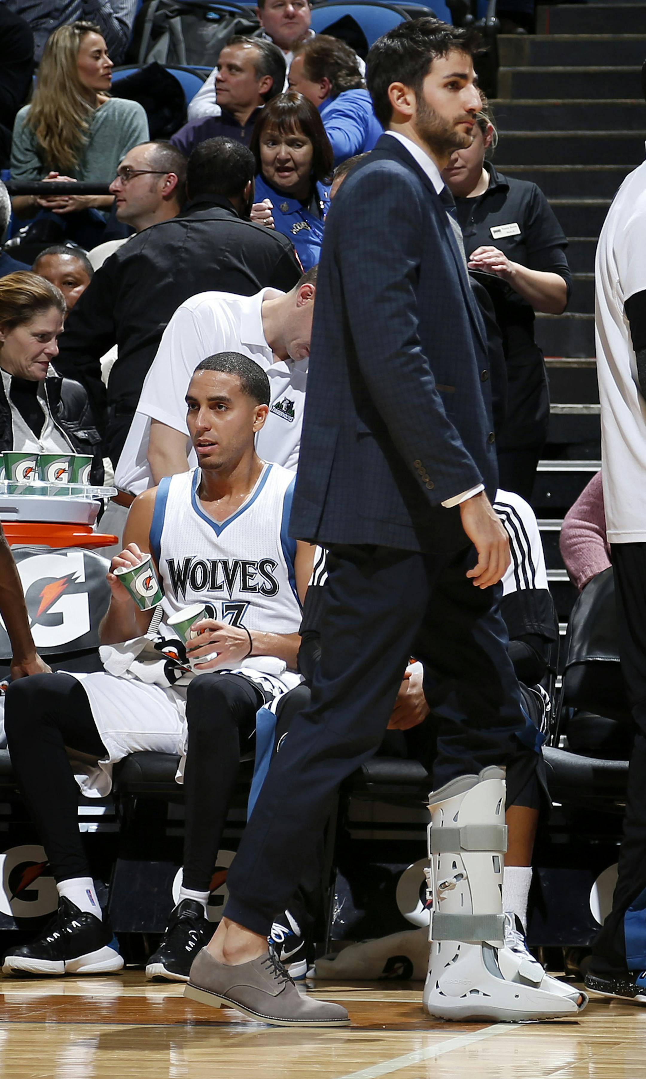 Injured Minnesota Timberwolves guard Ricky Rubio was in a walking cast during the game. Minnesota beat New York by a final score of 115-99. ] CARLOS GONZALEZ cgonzalez@startribune.com - November 19, 2014, Minneapolis, Minn., Target Center, NBA, Minnesota Timberwolves vs. New York Knicks