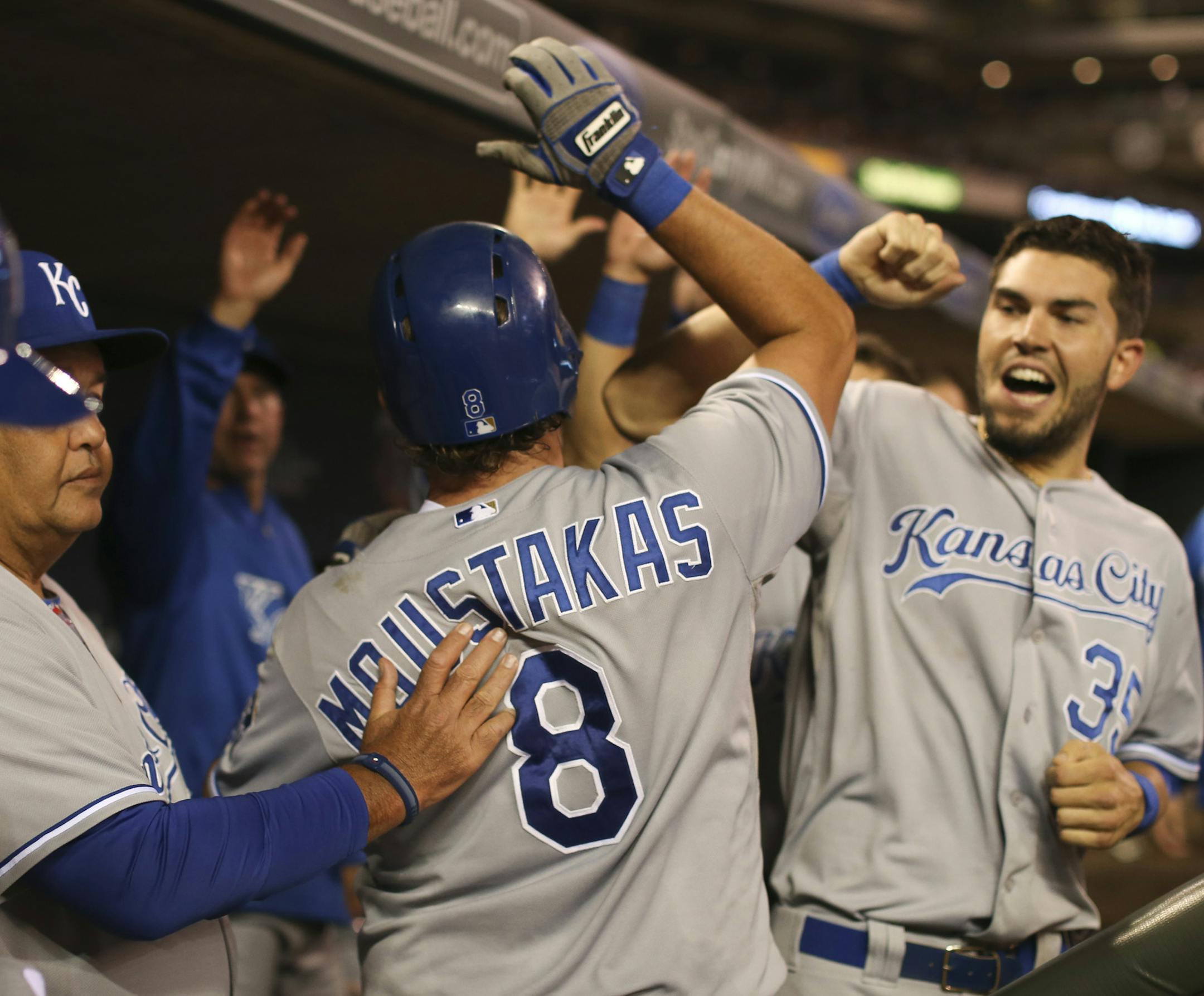 The MInnesota Twins lost the first game of their series with the Kansas City Royals 7-2 Tuesday night, July 30, 2013 at Target Field in Minneapolis. The Royals' Mike Moustakas was congratulated in the dugout after his solo homer in the eighth inning off Twins's reliever Brian Duensing. He hit a three run homer earlier in the game. ] JEFF WHEELER ‚Ä¢ jeff.wheeler@startribune.com