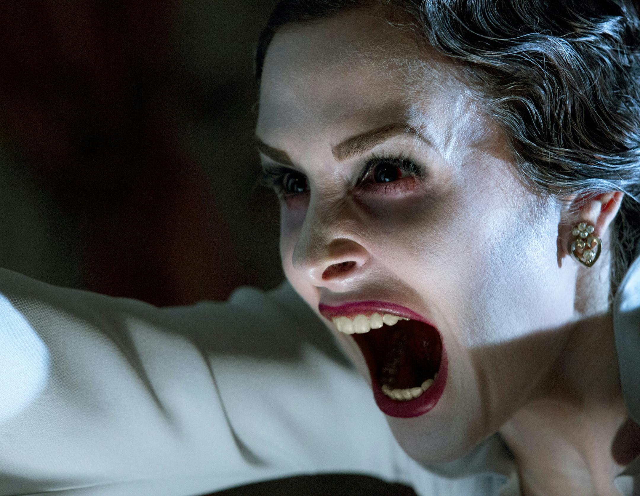 This film image released by FilmDistrict shows Danielle Bisutti in a scene from "Insidious: Chapter 2." (AP Photo/FilmDistrict, Matt Kennedy) ORG XMIT: MIN2013091115241613