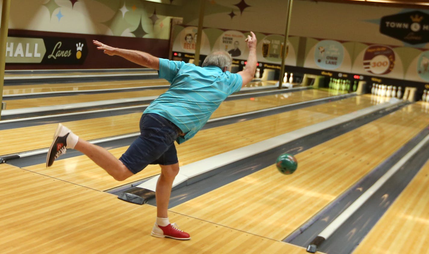 Bruce Selthow tested the Town Hall Lanes that he will be caring for in the New Restaurant Bowling alley in the Nokomis Neighborhood. The Lanes are completed reconditioned from the pinsetters to the new wood on the lanes. The opening day of the Town Hall Lanes, bowling alley on 34th and 50th in the Nokomis neighborhood is a great new spot. ] STAR TRIBUNE/TOM WALLACE Assignments #20029983A July 19, 2013 SLUG & MAGIC SAXO#: 676377 BARS072613 EXTRA INFO: 676377 Beloved Minneapolis brewpub Town Hall