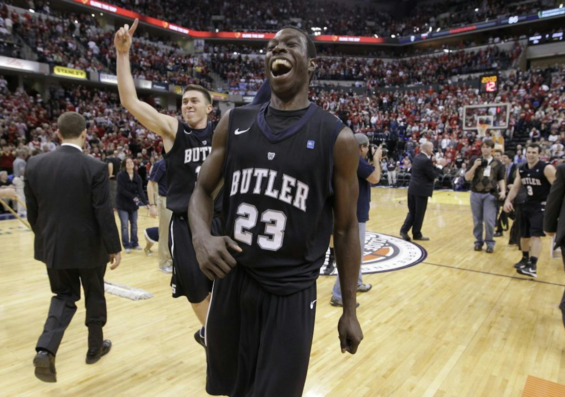 Butler forward Khyle Marshall (23) and guard Rotnei Clarke celebrated after Butler defeated No. 1 Indiana 88-86 in overtime in an NCAA college basketball game in Indianapolis, Saturday, Dec. 15, 2012.
