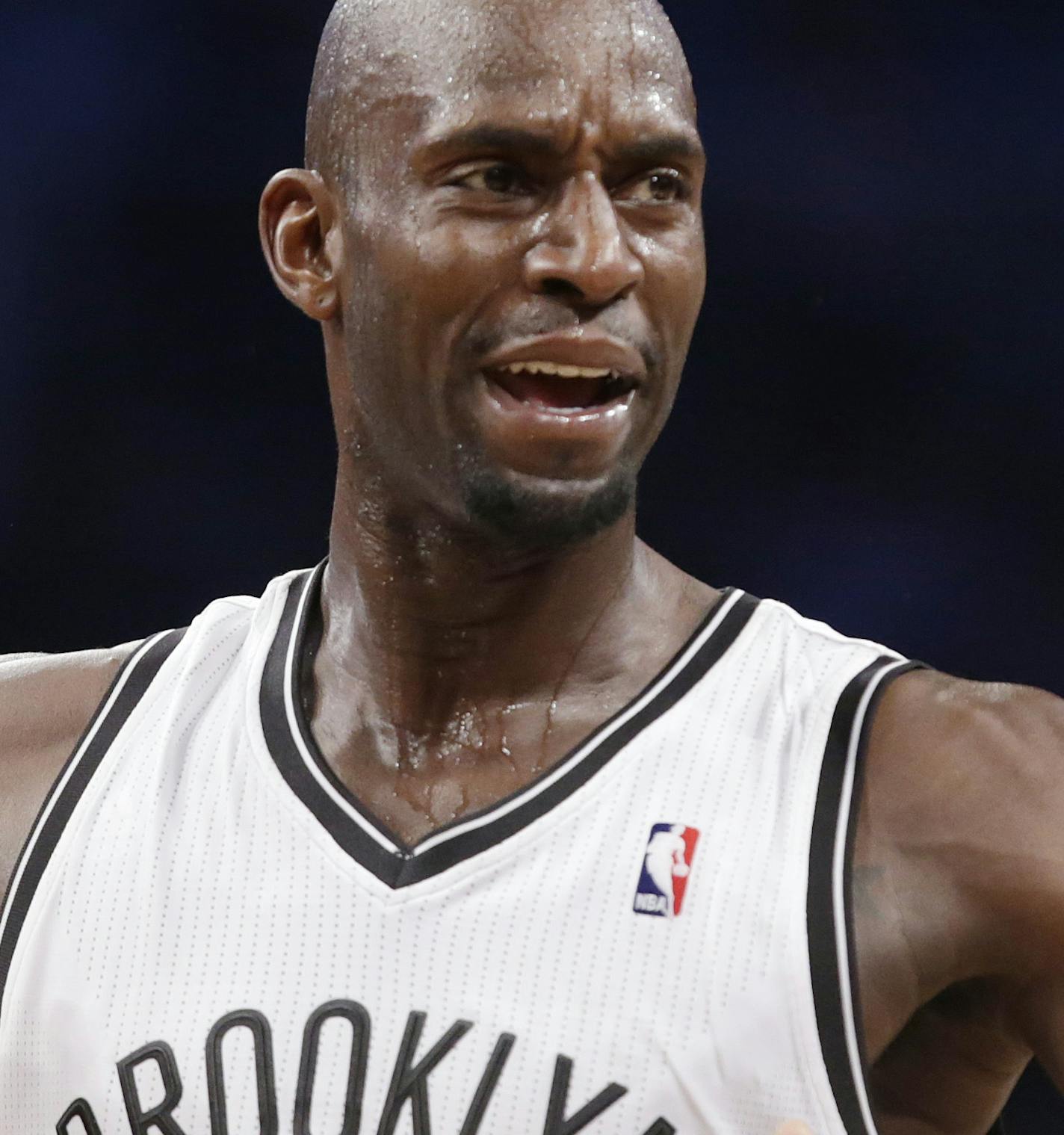 Brooklyn Nets power forward Kevin Garnett (2) expresses his disgust to a referee who penalized him in the second half of the Nets NBA basketball game against the Portland Trail Blazers at the Barclays Center, Monday, Nov. 18, 2013, in New York. (AP Photo/Kathy Willens) ORG XMIT: OTKKW109