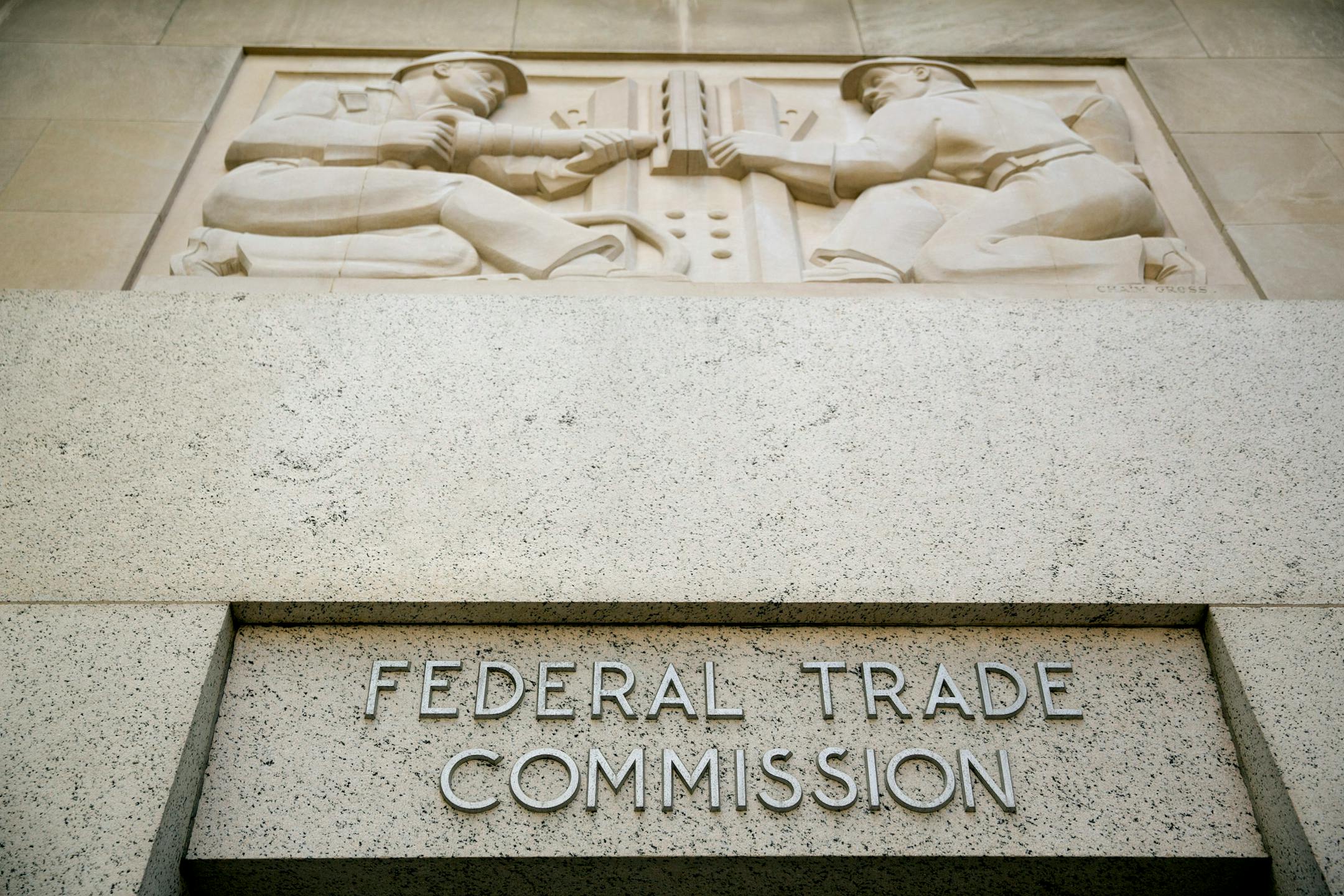 The Federal Trade Commission (FTC) headquarters stand in Washington, D.C., U.S., on Tuesday, May 14, 2013. Colleagues say economist Leemore Dafny's examination of health-insurance markets has helped to mold the state exchanges that are central to President Barack Obama�s 2010 health-care law, which allows qualified individuals and small businesses to purchase coverage. Photographer: Andrew Harrer/Bloomberg