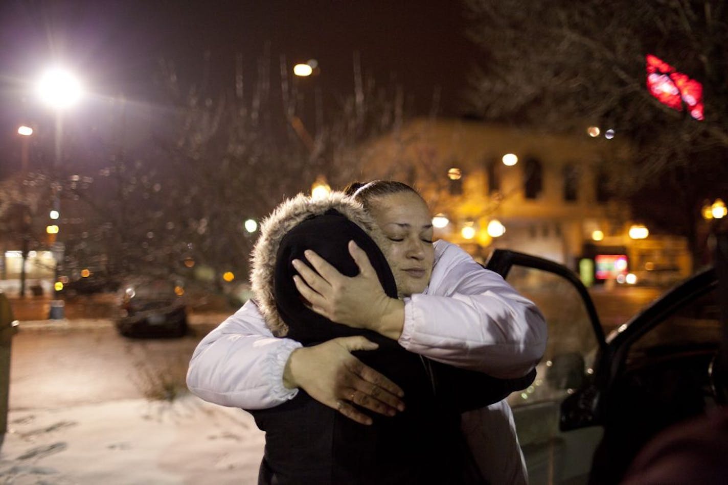 Joy Friedman hugged a woman named Lisa who was working as prostitute on Lake St. Wednesday night. Friedman, who knows the woman from previous encounters, gave her some condoms and personal hygiene items and visited with her. "Its and honor that she's updating me," she said. "As long as there's a breath in her she can make it work," she added, meaning that she could help the woman who was about 30, get off the streets. Friedman is women's programs manager for Breaking Free, a St. Paul based non-p