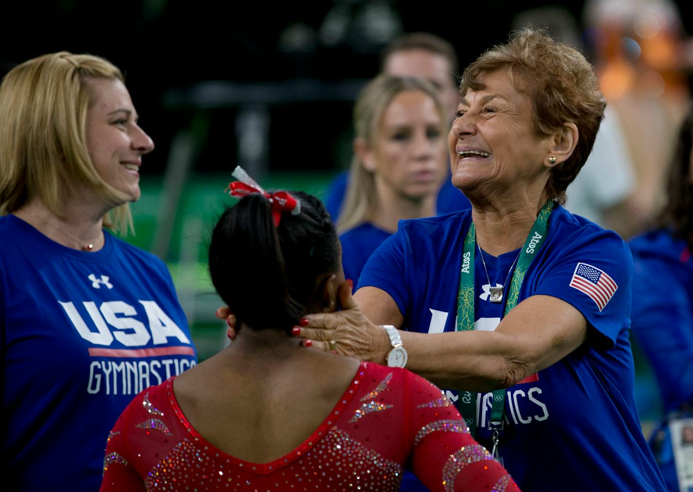 U.S. gymnastics coach Martha Karolyi to a moment from training in Rio to embrace superstar Simone Biles, who has a chance to become the next American all-around Olympic gold medalist later this week.