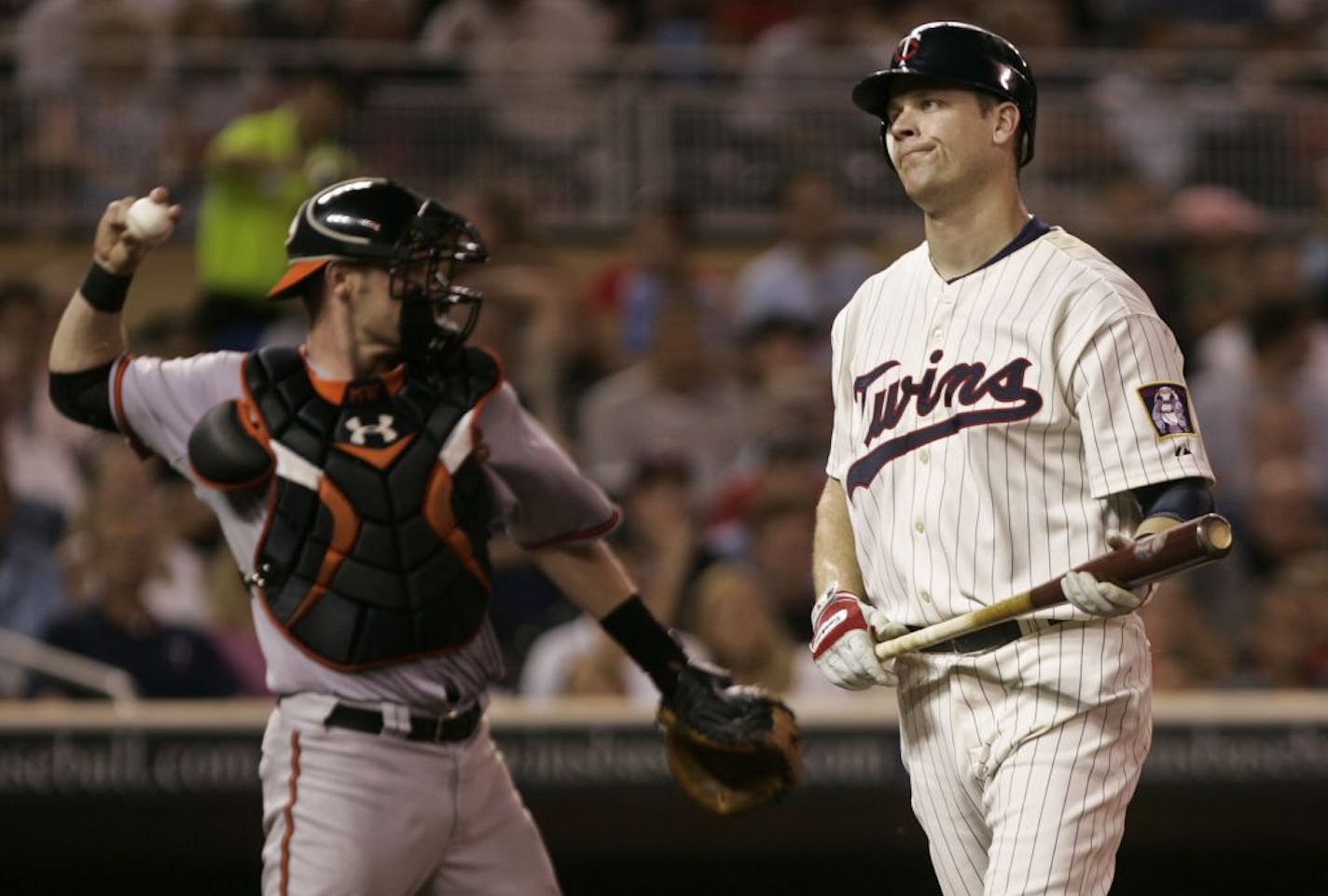 Justin Morneau returned to the Twins lineup in August after two months on the disabled list, but now he is out again because of concussion symptoms.