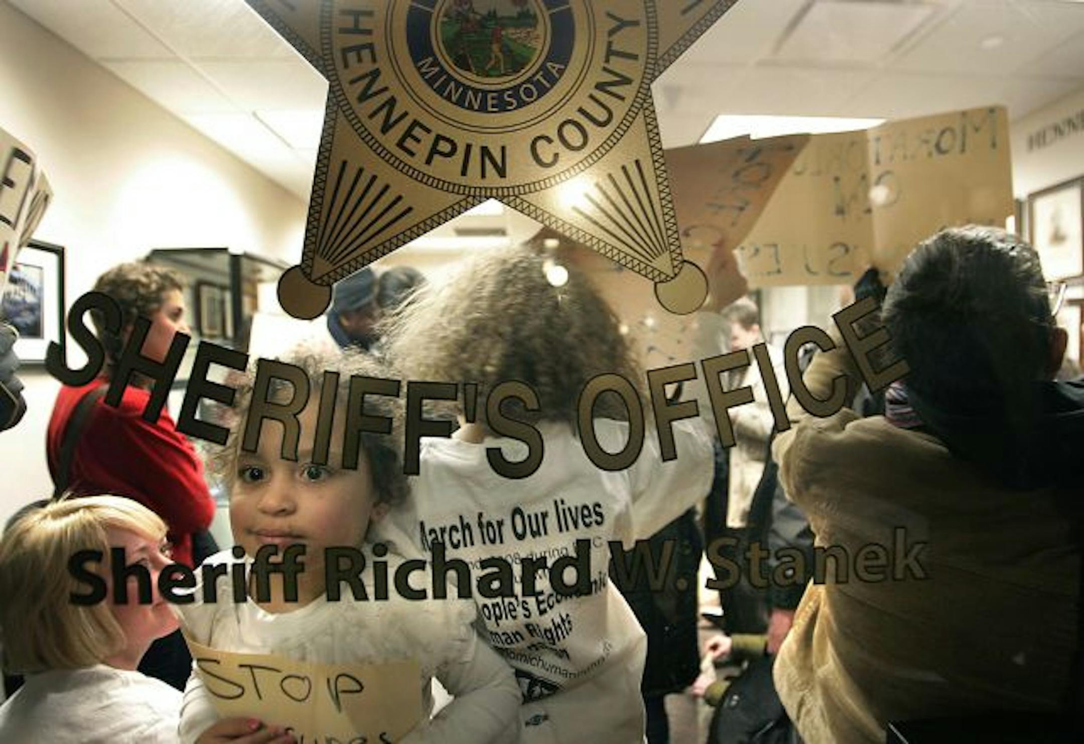 Shani Patterson's mother, Ann Patterson, and others protesting a sheriff's sale were promised a meeting with county officials in two weeks.