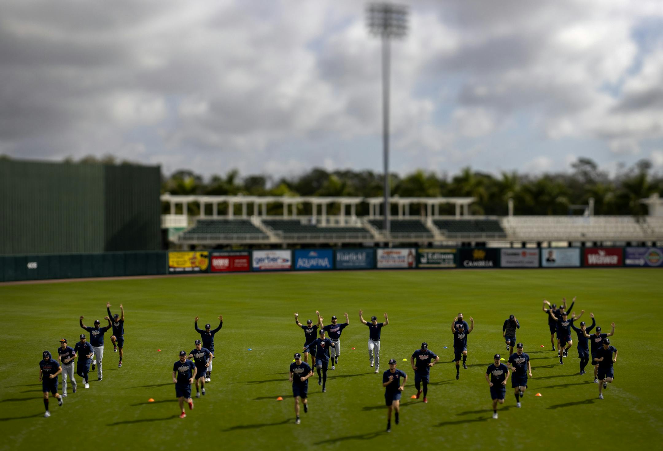 Minnesota Twins pitchers warmed up before practice on Friday in Fort Myers. ] CARLOS GONZALEZ • cgonzalez@startribune.com – Fort Myers, FL – February 14, 2020, CenturyLink Sports Complex, Hammond Stadium, Minnesota Twins, Spring Training