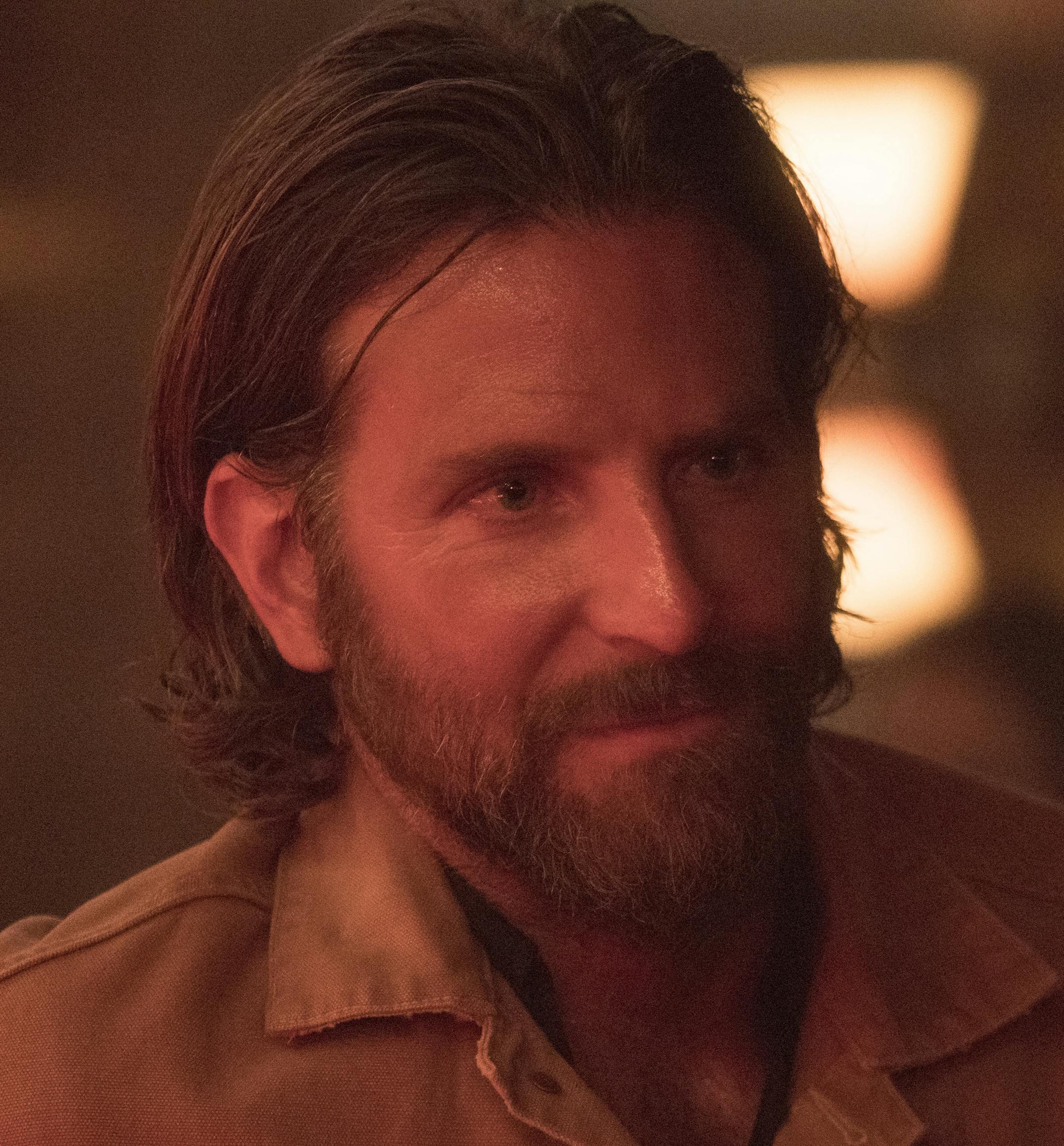 This image released by Warner Bros. shows Bradley Cooper in a scene from the latest reboot of the film, "A Star is Born." On Thursday, Dec. 6, 2018, Cooper was nominated for a Golden Globe award for lead actor in a motion picture drama for his role in the film. The 76th Golden Globe Awards will be held on Sunday, Jan. 6. (Clay Enos/Warner Bros. via AP)
