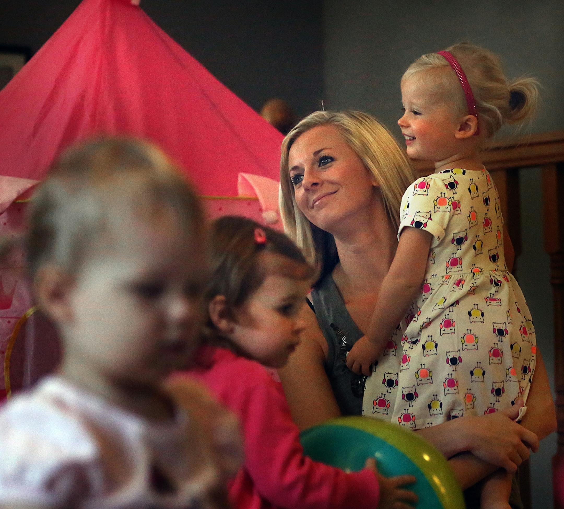 Sable Gass held her daughter, Louella, 20 months.