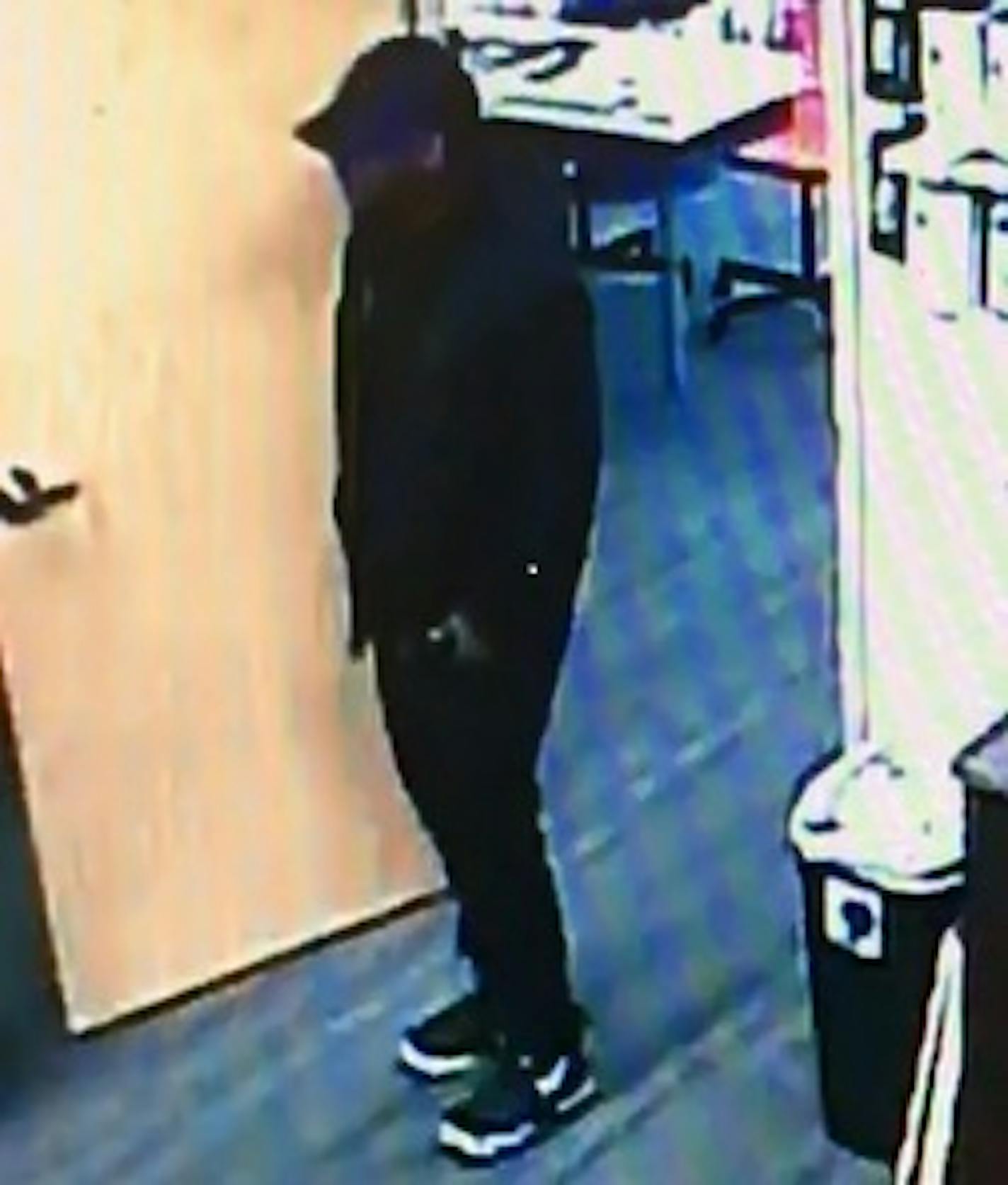 Police have released a surveillance image of a suspect they are looking for in the attempted armed robbery of a Verizon store in Inver Grove Heights.