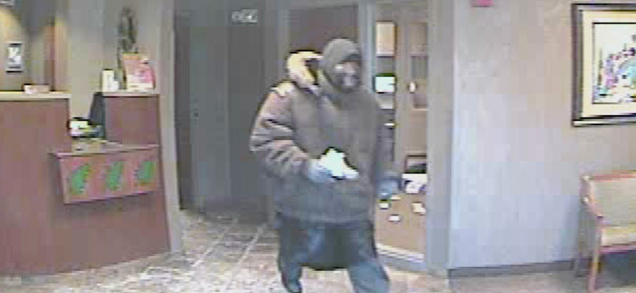 Bank surveillance cameras captured these images from the holdup Monday.