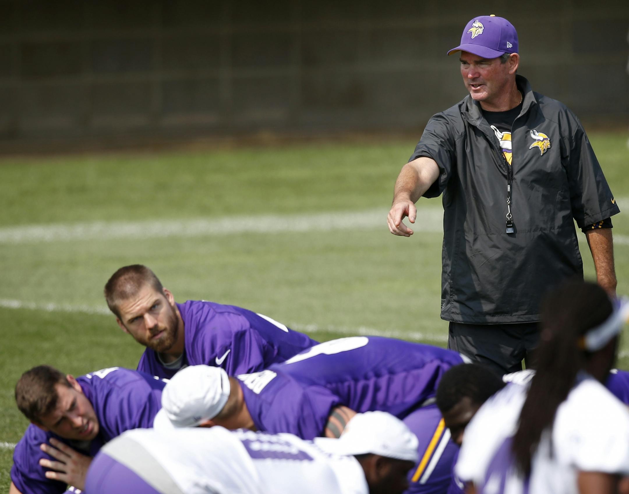 Minnesota Vikings head coach Mike Zimmer directed players during the morning practice on Friday.