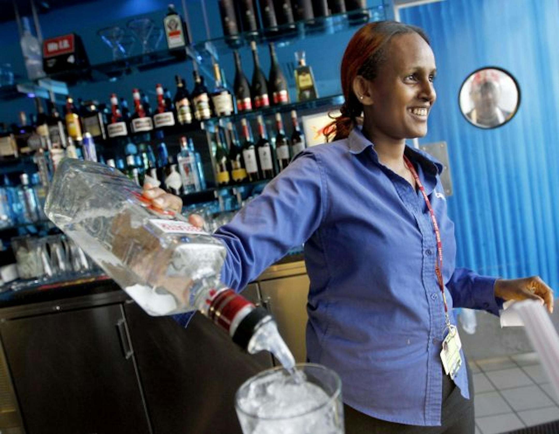 Haimanot Desta pours a drink at Icescapes.