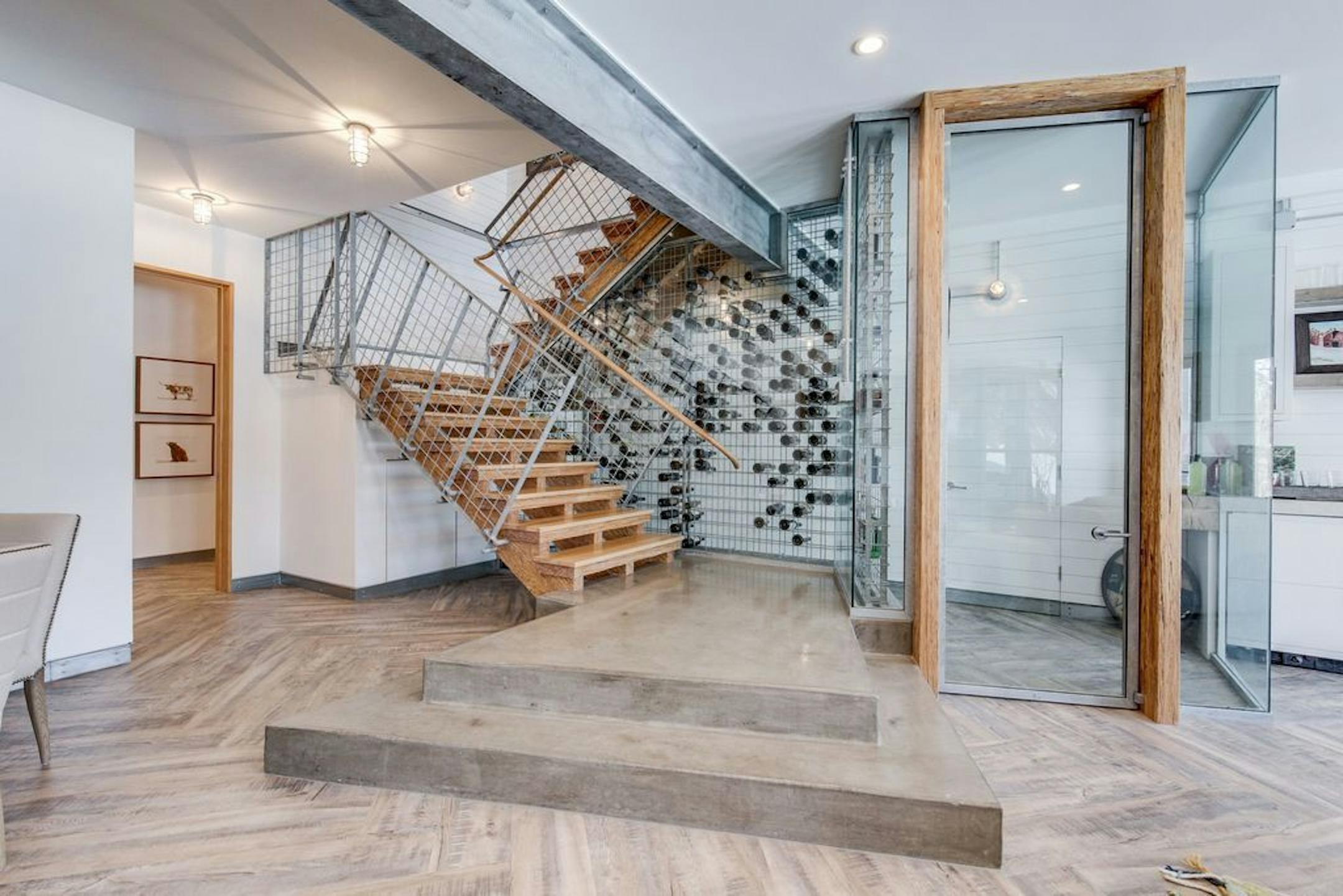 Under the stairs to the lower level is a unique wine cellar.