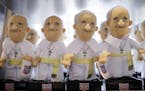 Pope Francis dolls are displayed at the World Meeting of Families souvenir store ahead of the Pope's scheduled visit, Tuesday, Sept. 22, 2015, in Phil