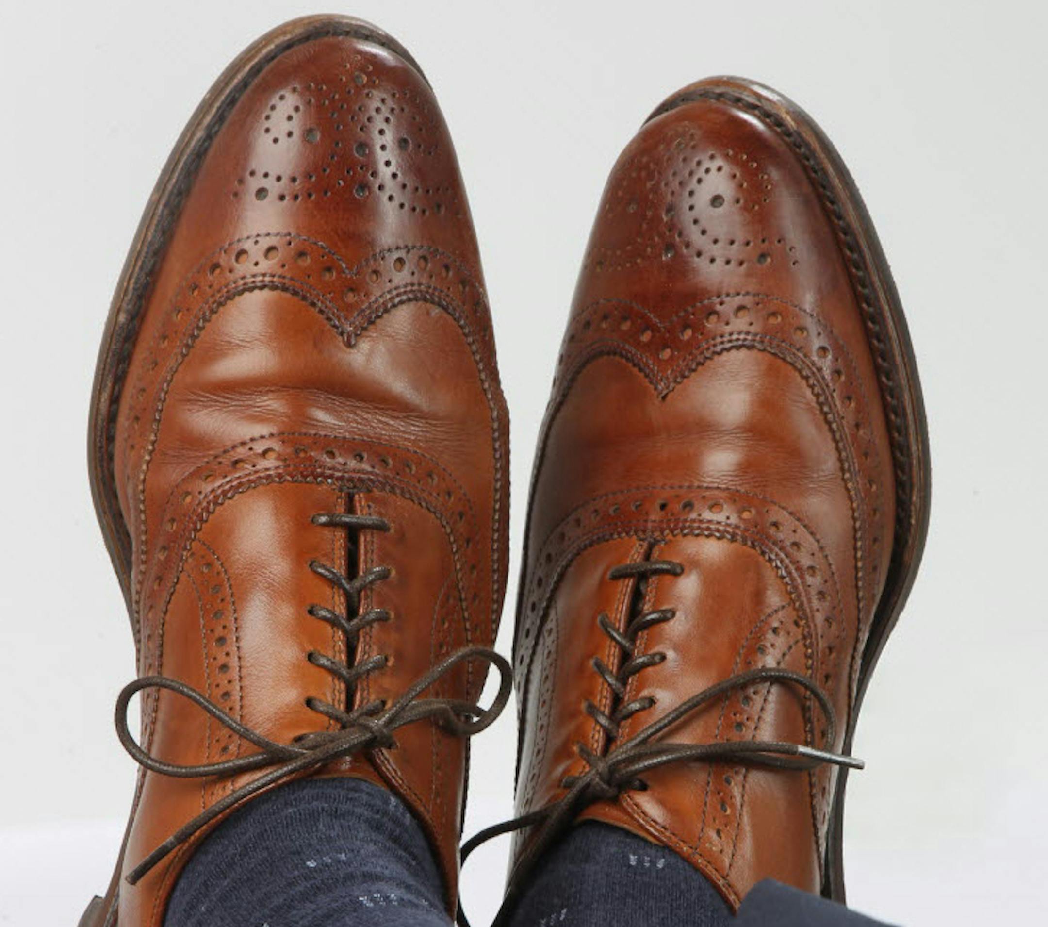 The shoes are Allen Edmonds, and the feet belong to Paul Grangaard, the Wisconsin company's CEO.